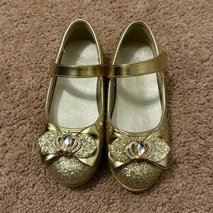 Stelle golden princess shoes. Great for holidays or dress up!